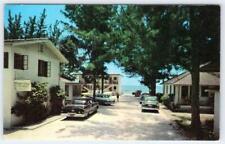 1950's SURF SONG COTTAGES MADEIRA BEACH OLD GULF BLVD ST PETERSBURG FL POSTCARD picture
