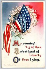 Ellen H Clapsaddle Patriotic~Song~”America”~Flag Draped Thru Flower Wreath~Gold picture
