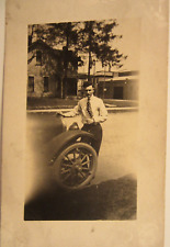 1926 FORD MODEL T, man smoking cigarette. COBBLE STONE ROAD, b&w RPPC. picture