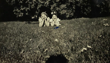 Two Pretty Women Laying In Grass Hands On Cheeks B&W Photograph 2.75 x 4.5 picture