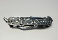 Sterling Antique Engraved Pocket Knife. Ten Utilities. 3-1/4 Length picture