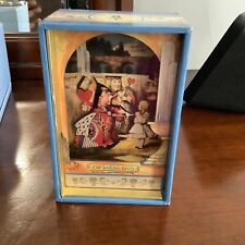 Alice in Wonderland pop goes the weasel music box picture