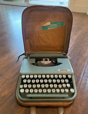 Vintage Teal Empire Portable Typewriter picture