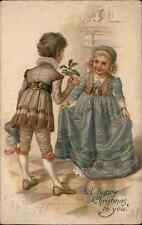 Nister No 730 Christmas Edwardian Boy and Girl c1910 Vintage Postcard picture