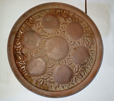 A very old antique tray made of copper, hand-engraved picture