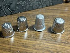 Lot of 4 Metal vintage THIMBLES...some marked picture