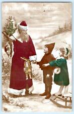 1910's SANTA CLAUS CHILDREN RED GREEN TOYS BRIGHT & JOLLY YULETIDE POSTCARD picture