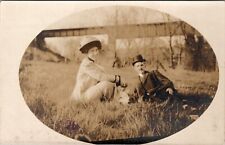 RPPC Darling Lady Dapper Gentleman In Grass Near Railroad Bridge Postcard Y13 picture