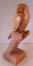 Kestrel carved in one piece of English Walnut and set on a tree stump picture