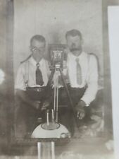 ODD PHOTOGRAPHERS WITH CAMERA ON TRIPOD RPPC picture