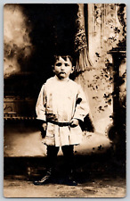 RPPC Studio Portrait Postcard~ Uniquely Dressed Young Unsmiling Young Boy picture