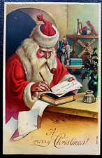 Santa Claus~Writes Letters~Toys on Shelf ~Antique~Christmas  Postcard~k203 picture