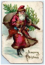 c1910's Christmas Santa Claus Carrying Pine Tree Sack Of Toys Embossed Postcard picture