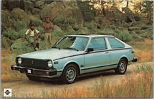 Vintage 1980 DATSUN 310 Car Advertising Postcard Macho Guys Attractive Men picture