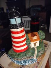 RARE CAST IRON LIGHTHOUSE DOOR STOP RED WHITE STRIPED LIGHTHOUSE  picture