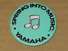 VINTAGE 1970s YAMAHA SPRING INTO MUSIC ADVERTISING PIN BUTTON picture