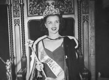Venus Ramey, from Washington DC, smiles as she wears her crown h- 1944 Photo picture
