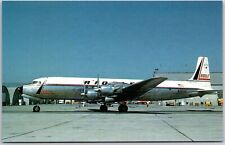 Airplane Riddle Airlines Douglas DC-7CF N301G MSN 45062 Oakland, CA Postcard picture