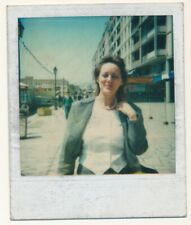Vintage found instant photo - young woman walking on Toulon, France harbour picture
