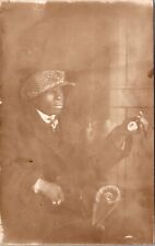RPPC Black Americana Well Dressed Young Man Holding Pocket Watch Checkered Cap picture