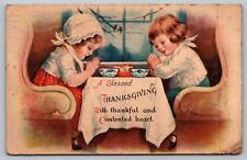 Postcard A Blessed Thanksgiving Two Girls Praying Over Dinner Ellen Clapsaddle picture