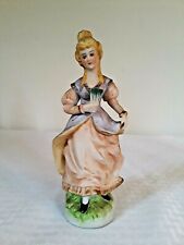 Rare Vintage Porcelain Figurine Woman with pink purple flowing dress holding Fan picture
