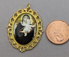 Virgin Mary with baby Jesus, religious pendant, gold tone made in Italy picture