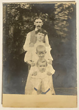 Antique RPPC 1900 Family of Four Lined Up - Unposted - Multilingual Postcard picture