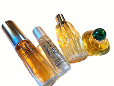 4 vintage Women's perfumes. DeLaurenta Liz Taylor Estee Lauder Dana picture