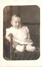 RPPC Baby Sitting Wicker Chair Antique Real Photograph Card Picture White Border picture