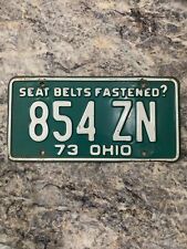Vintage 1973 Ohio 73 License Plate “Seat Belts Fastened” 854 ZN Nice Patina picture