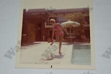 candid curvy blonde woman in pink bikini 1960's 3