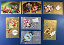 7 GOLD & SILVER Greetings Antique Postcards.EMB.Floral, Bird. PUBL: AA  1909 era picture
