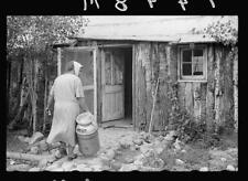 Mrs. Howard,lives in one-room cabin,Aitkin County,Minnesota,MN,September 1939,5 picture