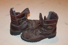 Vintage Worn-out Pair of Harley Davidson Motorcycles Boots. picture