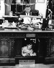 PRESIDENT JOHN F. KENNEDY & SON AT RESOLUTE DESK OVAL OFFICE 8X10 PHOTO (AA-195) picture