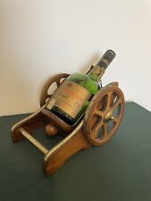 Canon bottle holder, old courvoisier cognac bottle, empty  picture