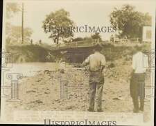 1947 Press Photo People gather to see a bridge toppled by flash flooding in Ohio picture
