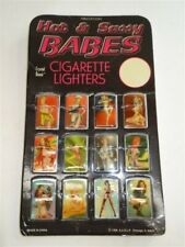 Vintage 12 NOS Hot & Sassy Novelty A.A.D.L.P. Cigarette Lighters Counter Display picture