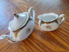 Antique Miniature Tea Pot 3” & Creamer 2