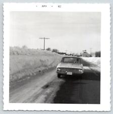 1960 VINTAGE FORD FALCON FUTURA SNOW COVERED ROAD SNOWDRIFTS VINTAGE SNAPSHOT picture