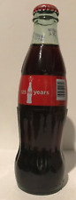 8 OZ COCA COLA COMMEMORATIVE BOTTLE - 2011 125 YEARS OF SHARING HAPPINESS picture