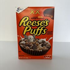 KAWS X REESE'S PUFFS CEREAL 11.5 OZ BOX COLLECTORS EDITION (UNOPENED) picture