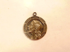 Older sterling silver medal of Jesus: I am a Presbyterian on the rev. picture