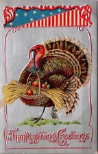 Patriotic Thanksgiving PC Turkey Holding a Basket Filled with Wheat and Fruit picture