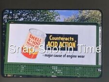 Shell X-100 Motor Oil  Billboard Advertising Slide 1952 picture