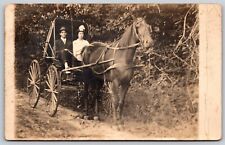 Postcard Man & Woman in Horse-Drawn Buggy Carriage RPPC P189 picture