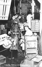 RPPC Men Working Labeling Machine C.R.P.A. Astoria Oregon Real Photo Postcard picture