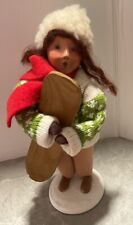 Byers Choice Retired 2012 Girl with Green Knit Sweater Carrying Snowboard picture
