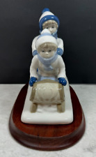 Vintage 1992 Paul Sebastian PS Boy & Girl on Sled Fine Porcelain Figurine picture
